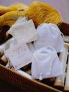 Set chăm sóc da gồm khăn mặt tơ tằm, khăn tắm, kén tẩy trang và túi tẩy trang